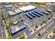 Aerial view of commercial area featuring solar panel shade structures, well-maintained landscaping at 13700 N Fountain Hills Blvd # 135, Fountain Hills, AZ 85268