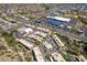 Expansive aerial view of a vibrant community featuring residences, retail spaces and lush desert landscaping at 13700 N Fountain Hills Blvd # 135, Fountain Hills, AZ 85268