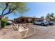 Exterior shot of the clubhouse with a ramp leading to the entrance and parking spaces at 13700 N Fountain Hills Blvd # 135, Fountain Hills, AZ 85268