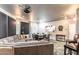 Spacious game room with a sectional sofa, large screen TV, and a table with chairs, perfect for entertaining at 13700 N Fountain Hills Blvd # 135, Fountain Hills, AZ 85268