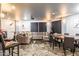 Large game room with a projector and screen, a gray sectional sofa, and a round game table with chairs at 13700 N Fountain Hills Blvd # 135, Fountain Hills, AZ 85268