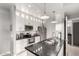 Modern kitchen with stainless steel appliances, granite countertops, and subway tile backsplash at 13700 N Fountain Hills Blvd # 135, Fountain Hills, AZ 85268