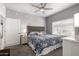 Comfortable main bedroom with a ceiling fan and ensuite bathroom access at 13700 N Fountain Hills Blvd # 135, Fountain Hills, AZ 85268