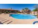 Community pool with lounge seating and a waterfall feature, perfect for relaxation at 13700 N Fountain Hills Blvd # 135, Fountain Hills, AZ 85268
