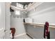 Walk-in closet featuring shelving, a small window and carpeted flooring to keep belongings organized at 13700 N Fountain Hills Blvd # 135, Fountain Hills, AZ 85268