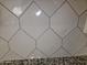 Close up of the diamond-shaped backsplash in the kitchen at 14224 W Hackamore Dr, Surprise, AZ 85387