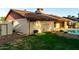 Spacious backyard featuring a pool, patio, and well-maintained lawn, perfect for outdoor enjoyment at 16638 N 46Th Ln, Glendale, AZ 85306