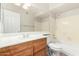 Bathroom featuring a single sink vanity and tub/shower combo at 16638 N 46Th Ln, Glendale, AZ 85306