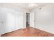 Bedroom with closet doors, new flooring and neutral paint at 16638 N 46Th Ln, Glendale, AZ 85306