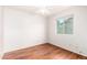 Bright bedroom features a ceiling fan and wood-look flooring at 16638 N 46Th Ln, Glendale, AZ 85306