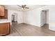 Open-concept kitchen featuring wood cabinets and countertops at 16638 N 46Th Ln, Glendale, AZ 85306