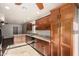 Well-equipped kitchen with wood cabinets, granite countertops, and stainless steel appliances at 16638 N 46Th Ln, Glendale, AZ 85306
