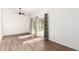 Bright living room with sliding glass doors and modern flooring at 16638 N 46Th Ln, Glendale, AZ 85306