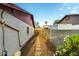 The side yard features a walkway and attractive landscaping at 16638 N 46Th Ln, Glendale, AZ 85306