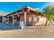 Exterior view of the community clubhouse with ample parking and signage at 17200 W Bell Rd # 840, Surprise, AZ 85374