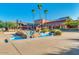 Community clubhouse with well-maintained water feature and desert landscaping at 17200 W Bell Rd # 840, Surprise, AZ 85374