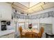 Cozy dining area with seating for four, next to the kitchen at 17200 W Bell Rd # 840, Surprise, AZ 85374