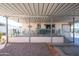 Covered patio features outdoor seating and leads to gravel yard at 17200 W Bell Rd # 840, Surprise, AZ 85374