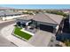 Stunning aerial view of a home highlighting the manicured front yard and elegant exterior design at 17710 W Guthrie St, Surprise, AZ 85388
