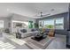 Comfortable living room with stylish decor, large windows and an open layout at 17710 W Guthrie St, Surprise, AZ 85388