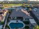 Gorgeous backyard with a pool, patio, and pergola with an outdoor kitchen at 18126 W Ocotillo Ave, Goodyear, AZ 85338