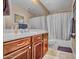 Clean, well-lit bathroom featuring modern fixtures and a shower-tub combination at 18126 W Ocotillo Ave, Goodyear, AZ 85338