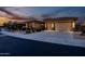 Well-maintained home with desert landscaping and a three car garage at 18126 W Ocotillo Ave, Goodyear, AZ 85338