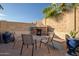 Outdoor fireplace area featuring seating, perfect for cozy evenings at 18126 W Ocotillo Ave, Goodyear, AZ 85338