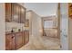 Upstairs hallway with built-in cabinets and a view of the railing at 18126 W Ocotillo Ave, Goodyear, AZ 85338