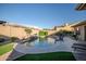 Backyard pool with a waterfall feature and lush greenery at 18126 W Ocotillo Ave, Goodyear, AZ 85338