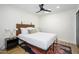 Bright bedroom with a patterned rug, minimalist furniture, and sleek lighting fixtures at 2044 N 71St St, Scottsdale, AZ 85257