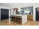 Modern kitchen featuring stainless steel appliances, white countertops, and stylish pendant lighting at 2044 N 71St St, Scottsdale, AZ 85257