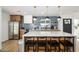 Modern kitchen featuring stainless steel appliances, white countertops, and stylish pendant lighting at 2044 N 71St St, Scottsdale, AZ 85257