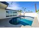 Backyard pool offers a refreshing escape with ample space for lounging and enjoying the outdoor scenery at 2044 N 71St St, Scottsdale, AZ 85257