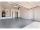 Spacious three car garage with epoxy floors and ample storage or work space at 2110 E Kerry Ln, Phoenix, AZ 85024
