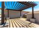 Covered pergola for enjoying the sunny weather while staying in the shade at 2110 E Kerry Ln, Phoenix, AZ 85024