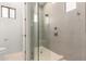 Modern bathroom featuring glass enclosed walk-in shower and white tile at 2110 E Kerry Ln, Phoenix, AZ 85024