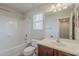 Bathroom featuring bath tub, tiled shower, and wood grain vanity at 2144 W Barwick Dr, Phoenix, AZ 85085