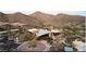 Expansive community center with mountain backdrop, tennis courts, lush landscaping, and convenient parking at 2144 W Barwick Dr, Phoenix, AZ 85085