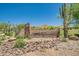 Scenic community center sign featuring desert landscaping and mountain views under a clear blue sky at 2144 W Barwick Dr, Phoenix, AZ 85085