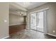 Dining area features tile floor, sliding glass doors to patio, and an open floorplan at 2144 W Barwick Dr, Phoenix, AZ 85085