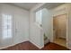 Entryway showcases hardwood floors, white walls, and a staircase at 2144 W Barwick Dr, Phoenix, AZ 85085