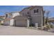 Charming two-story home with a two-car garage and desert landscaping at 2144 W Barwick Dr, Phoenix, AZ 85085