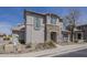Charming two-story home featuring stone accents around the front entry and shuttered windows at 2144 W Barwick Dr, Phoenix, AZ 85085