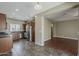 Open kitchen showcases granite countertops, stainless steel appliances, and tile flooring at 2144 W Barwick Dr, Phoenix, AZ 85085