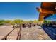 Inviting outdoor patio with comfortable seating and scenic views of lush landscaping at 2144 W Barwick Dr, Phoenix, AZ 85085