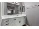 Bathroom featuring updated white vanity and framed mirror at 2146 W Isabella Ave # 127, Mesa, AZ 85202
