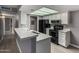 Well-lit kitchen with white cabinets, updated countertops, and stainless steel appliances at 2146 W Isabella Ave # 127, Mesa, AZ 85202