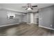 Open-concept living room flowing seamlessly into kitchen at 2146 W Isabella Ave # 127, Mesa, AZ 85202