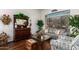 Inviting living room with a large window, stylish furnishings, and hardwood floors at 22026 N 44Th Pl, Phoenix, AZ 85050